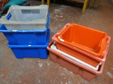 Seven Plastic Storage Boxes