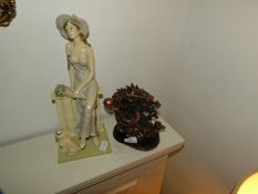 Lady Figurine and an Ornate Dragon Figurine