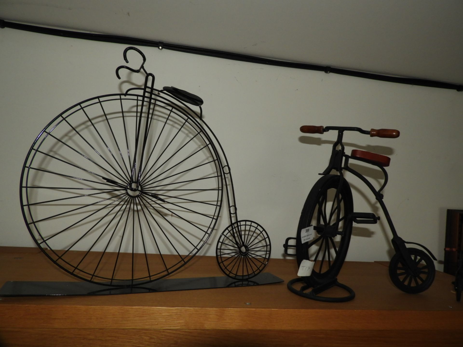 Two Metal Unicycle Ornaments