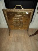Embossed Brass Fire Screen Depicting a Sailing Gal
