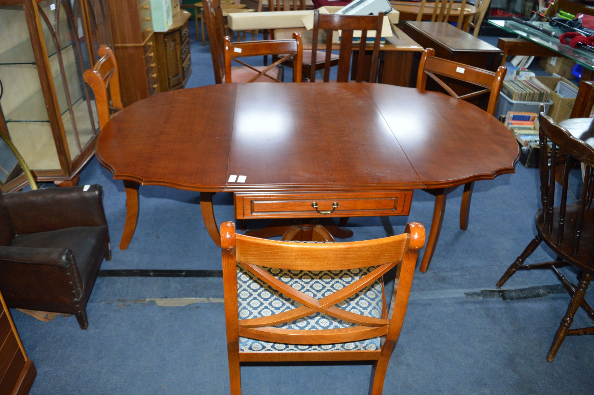 Modern Oval Dining Table with Four Matching Uphols