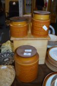 Three Hornsea Pottery Storage Jars and a Bread Bin