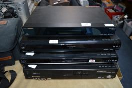 Three Panasonic DVD Players and a Humax Freesat Bo