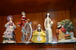 Five Pottery Ornaments Including a Lady on a Penny