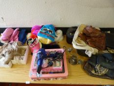 Table of Hats, Bags, Gloves, Hairdryer, etc.