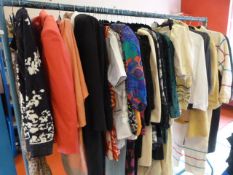 Rail of Assorted Dresses, Jackets and Tops