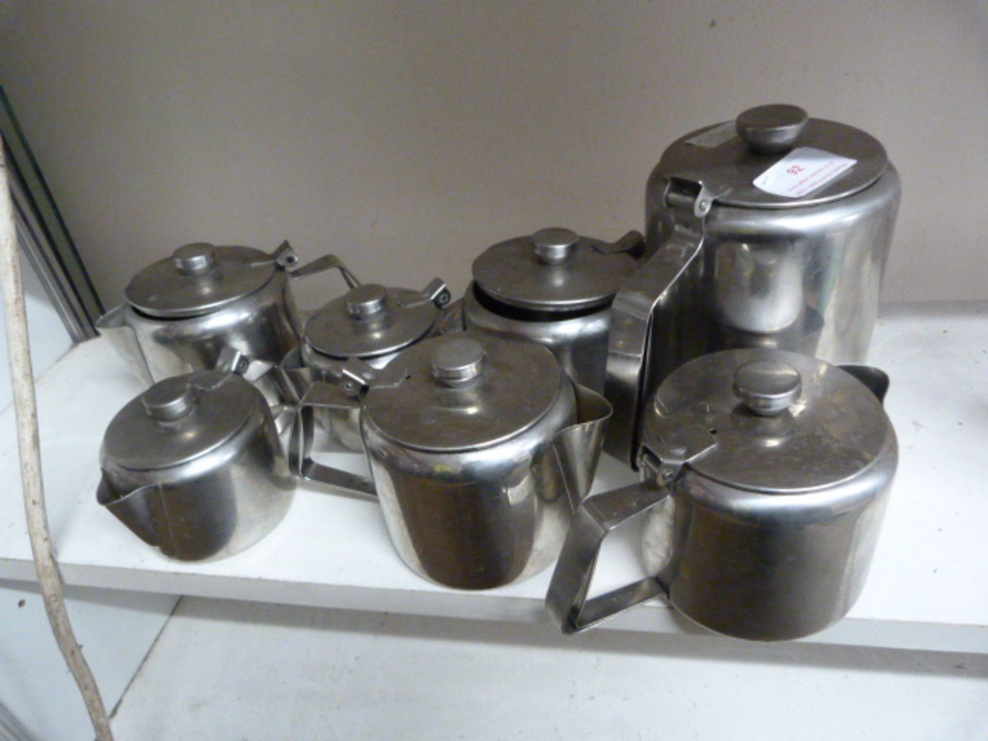 Seven Stainless Steel Hot Water Jugs