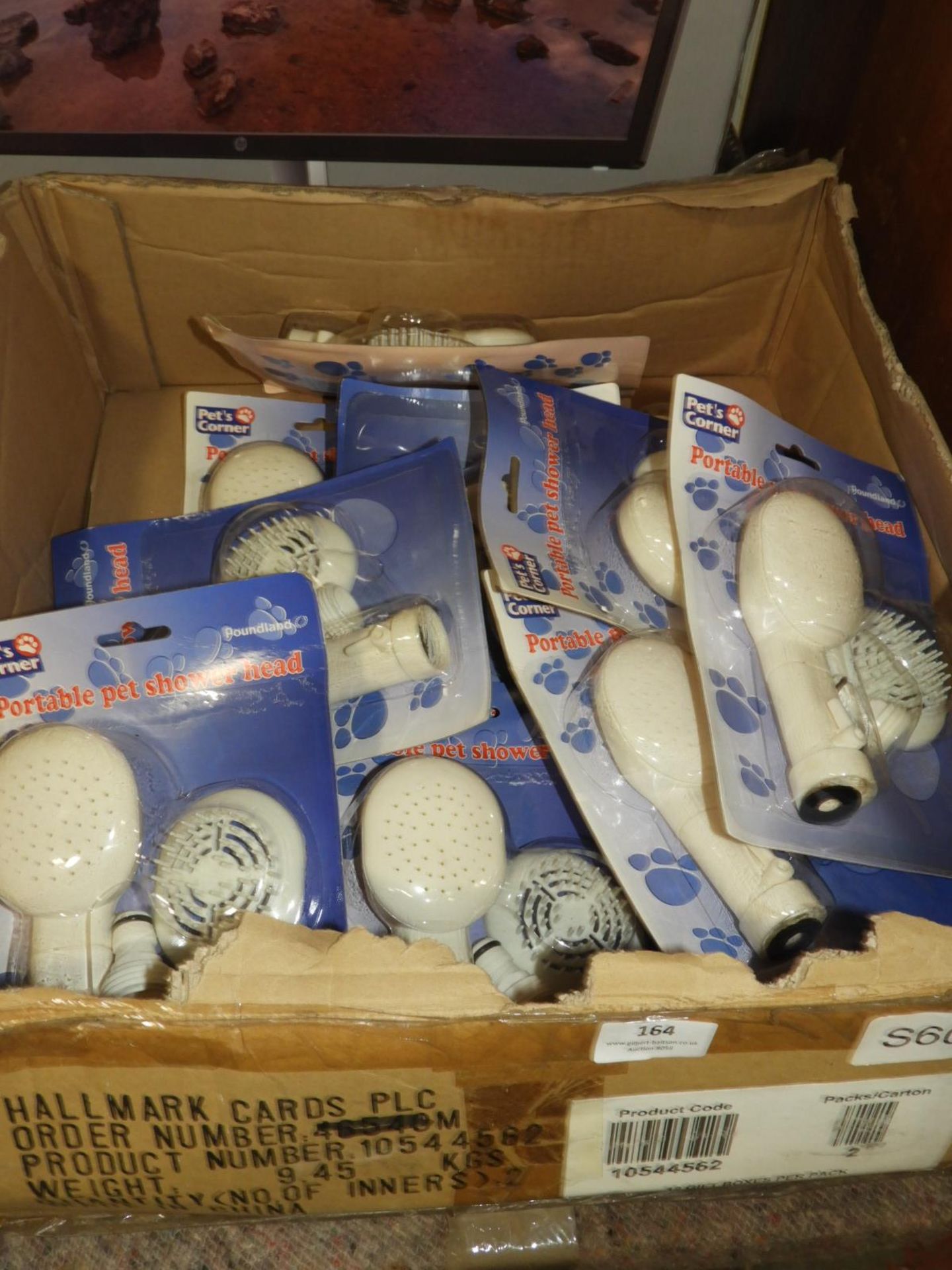 Box Containing Portable Pet Shower Heads