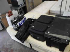 Plastic Storage Box and a Suitcase Containing Asso