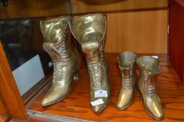 Two Pairs of Brass Boots