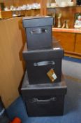 Three Brown Leather Storage Boxes