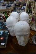 Four Polystyrene Male Heads