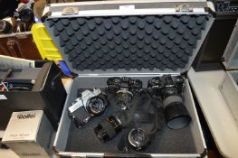 Aluminium Hard Case Containing Three Minolta Cameras