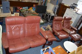 Three Piece Stress-Less Red Leather Suite Including Two Seat S