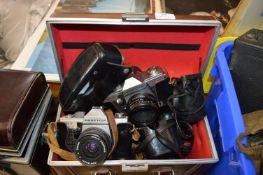 Brown Case Containing Vintage Cameras