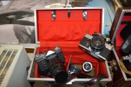 Brown Leather Case Containing Vintage Cameras