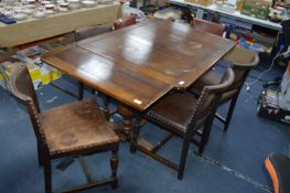1930's Dining Table and Six Leather Upholstered Di