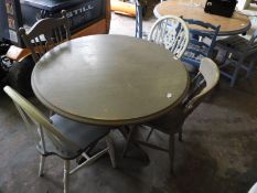 *Painted Circular Table with Four Eclectic Chairs