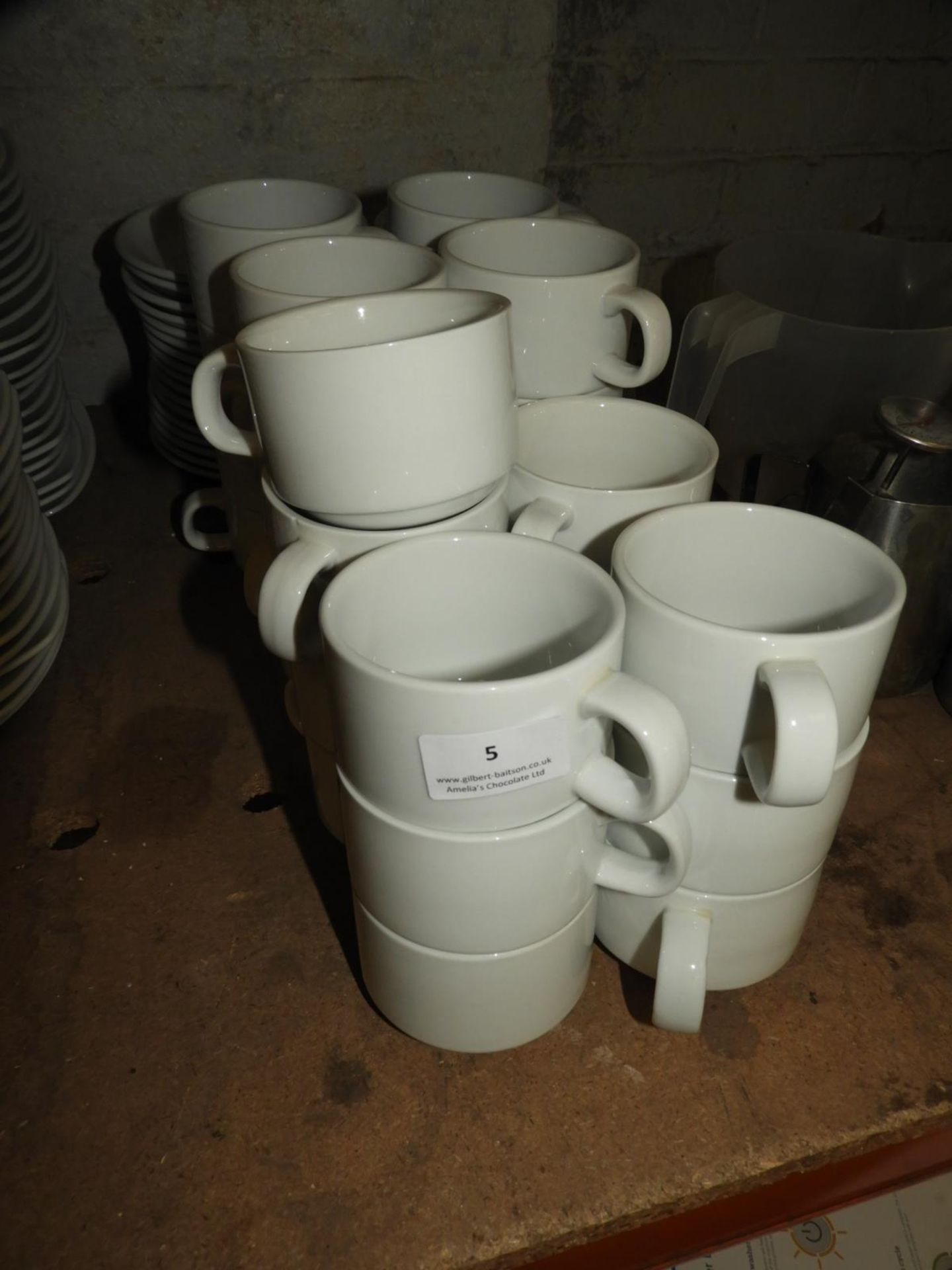 *Twenty Eight White Teacups and Saucers