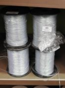 *Four Rolls of Iridescent Braided Threads