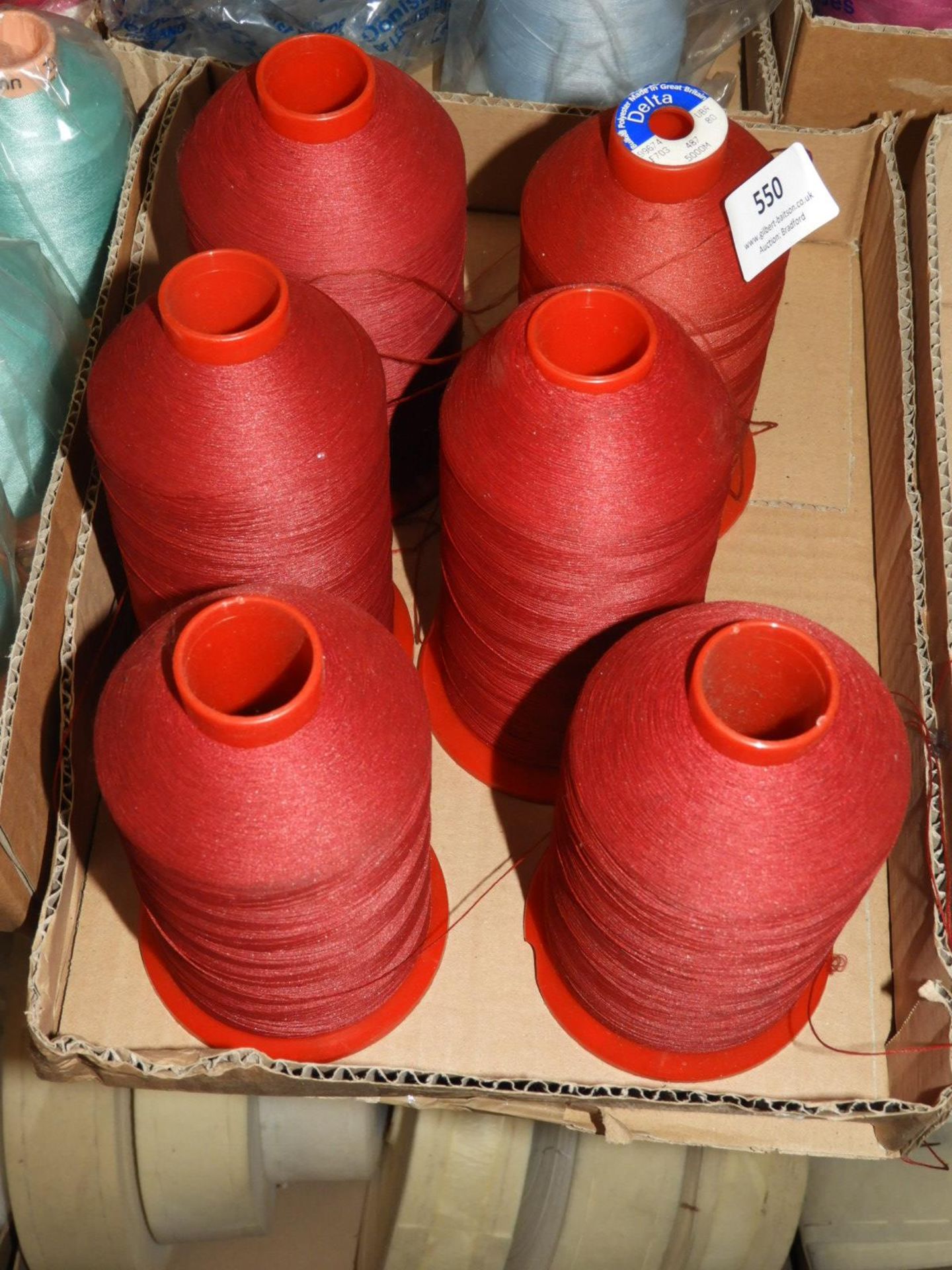 *Six Rolls of Red Sewing Thread
