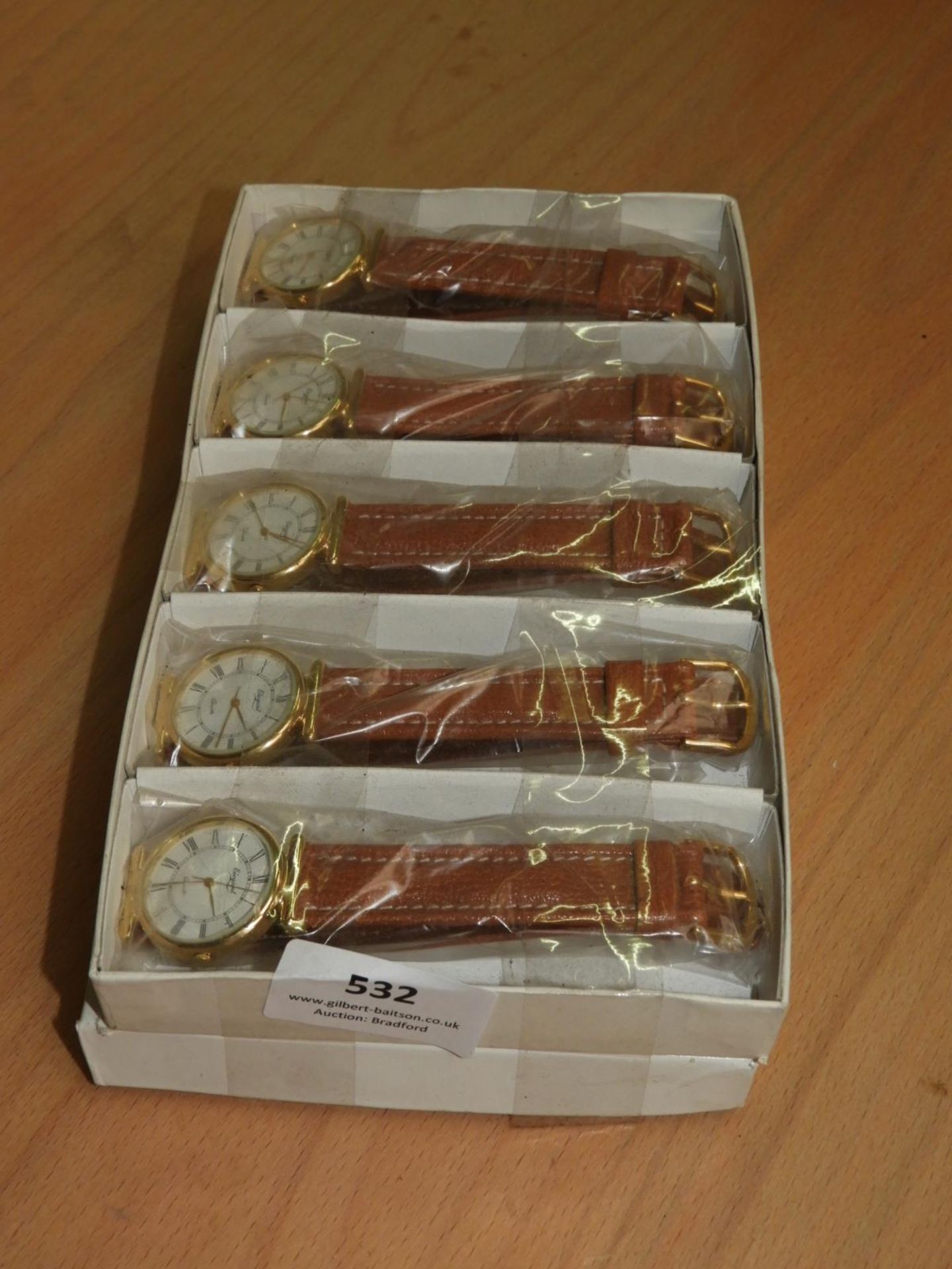 *Box Containing 10 Wristwatches with Roman Numeral