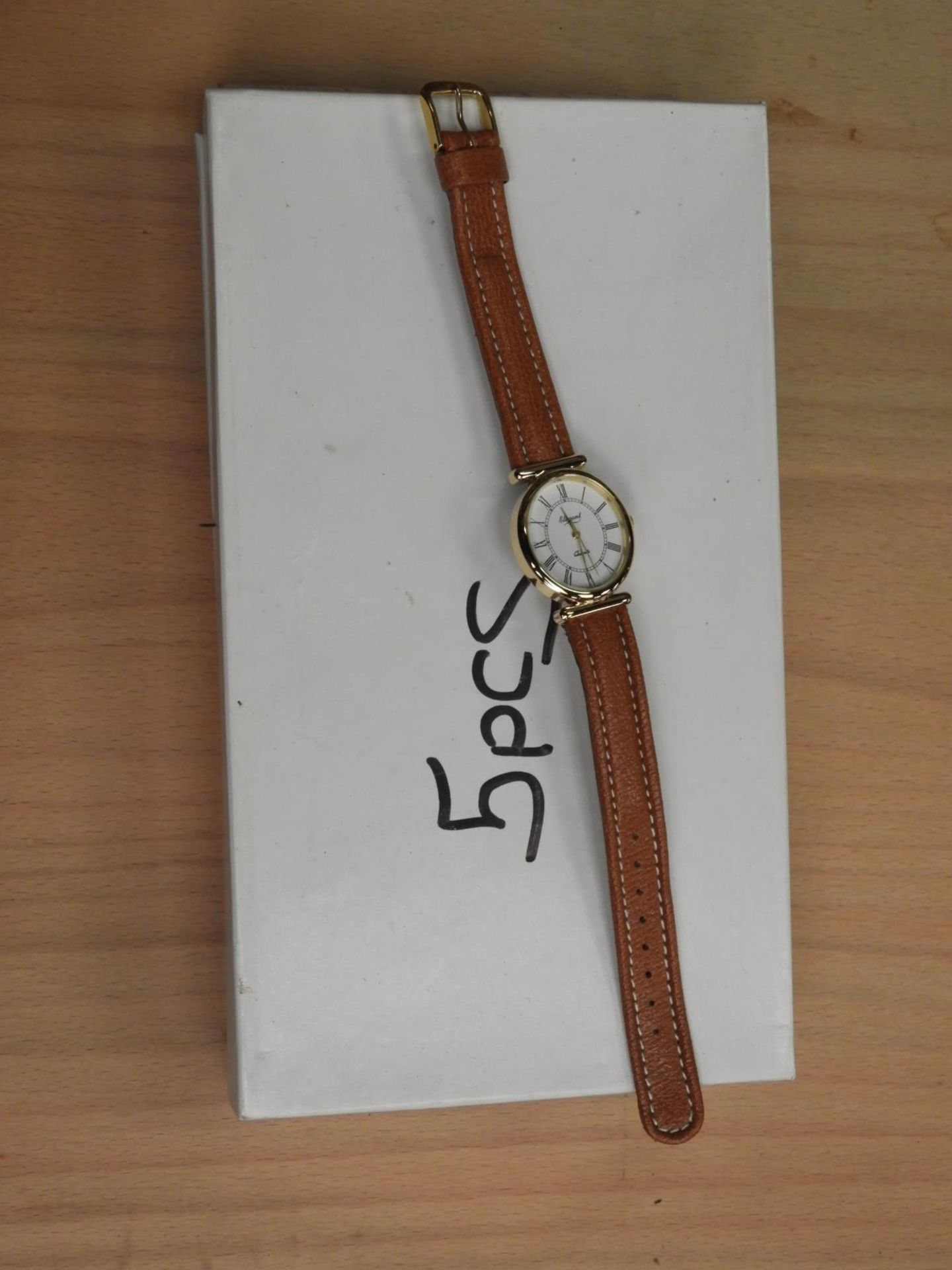*Box Containing 10 Wristwatches with Roman Numeral