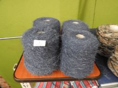 *Four Rolls of Blue Knitting Yarn