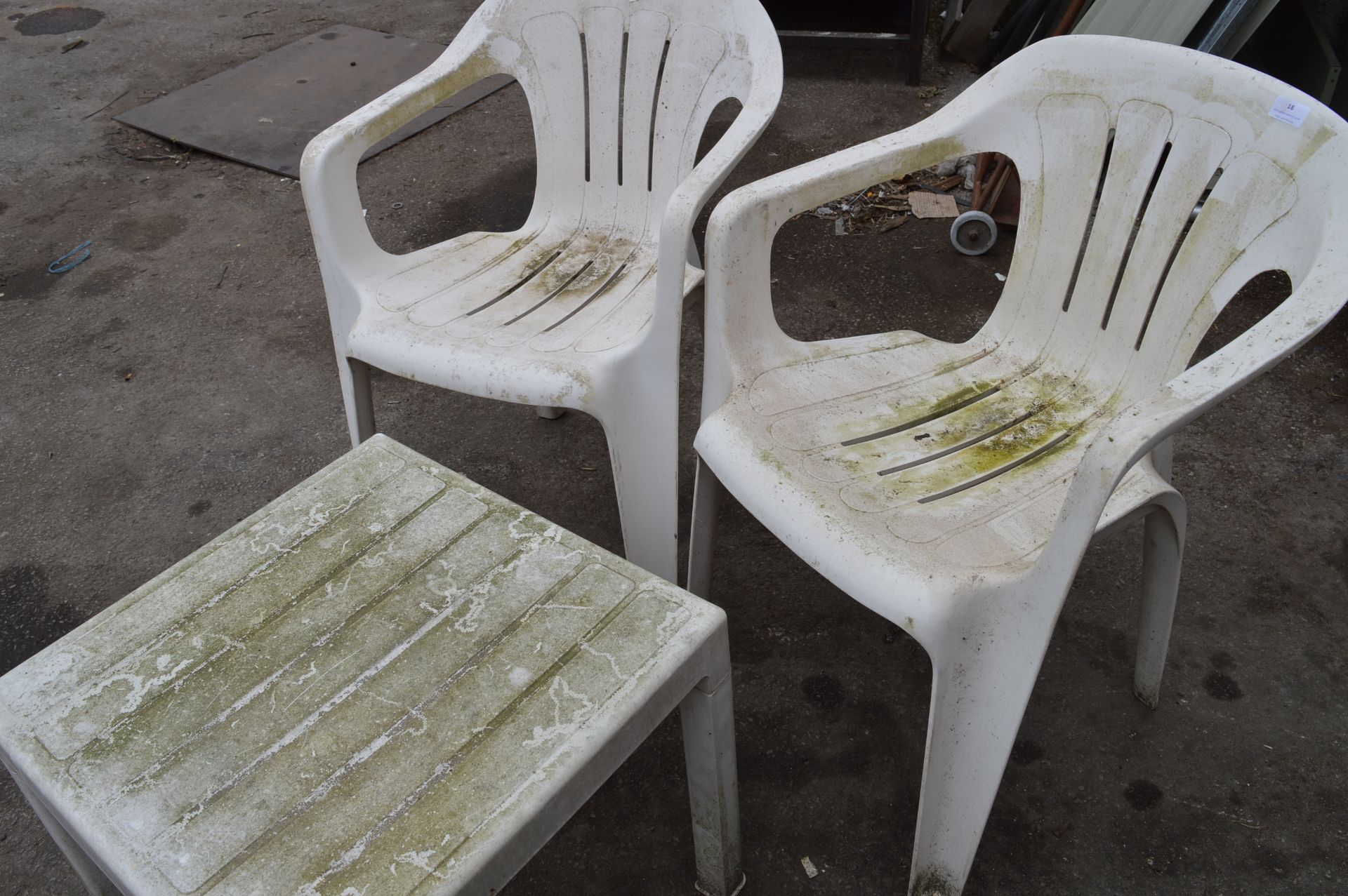 Two Plastic Garden Chairs and a Side Table