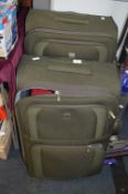 Two Green Tripp Suitcases plus One Other