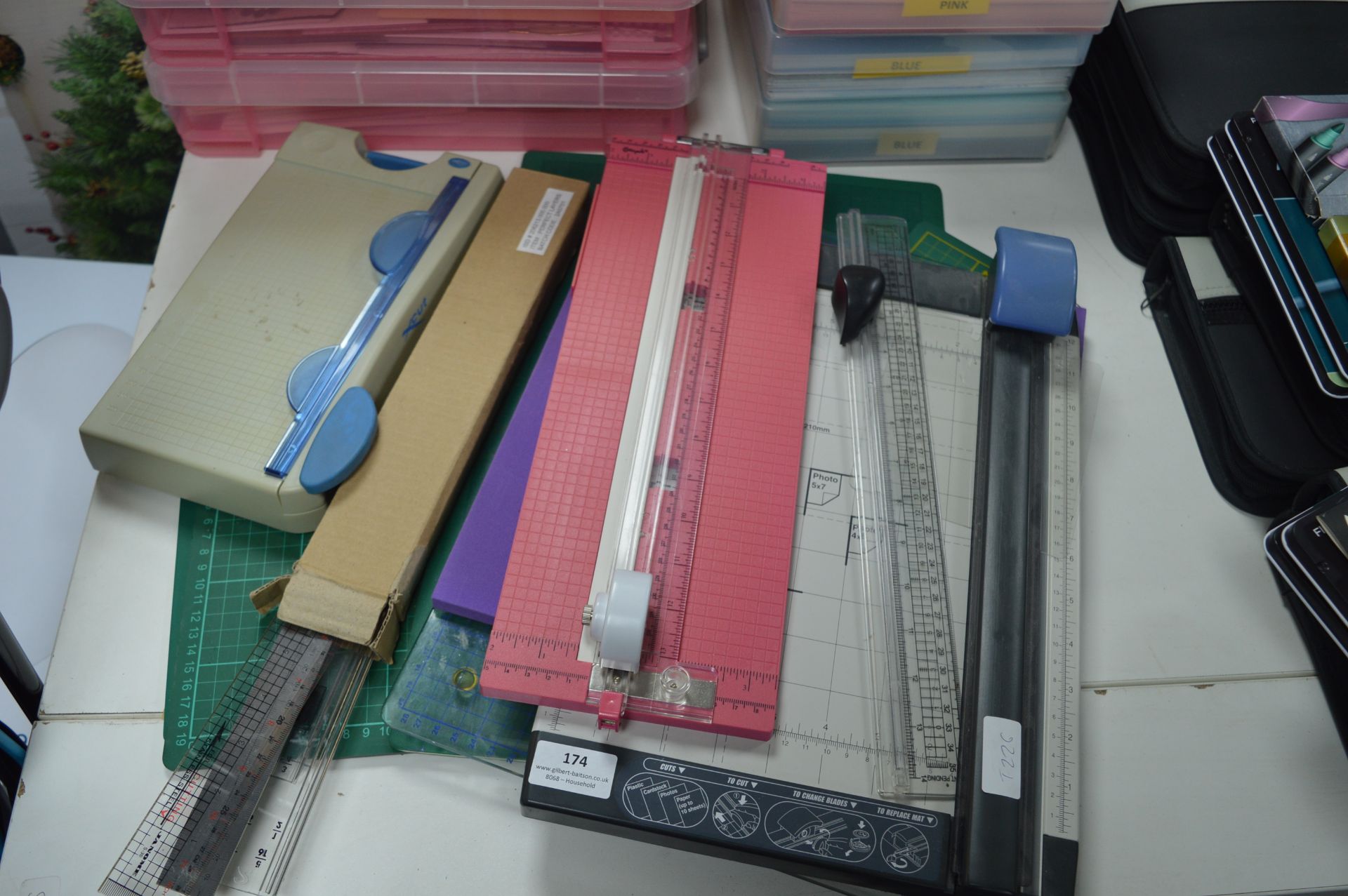 Assortment of Paper Trimmers, Cutting Mats, Rulers