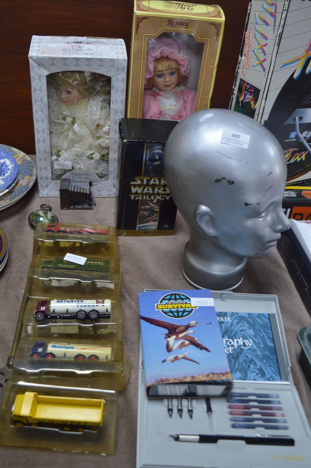 Assorted Lot of Decorative Items Including Dolls,