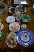 Assortment of Pottery Items Including Plates, Bowl