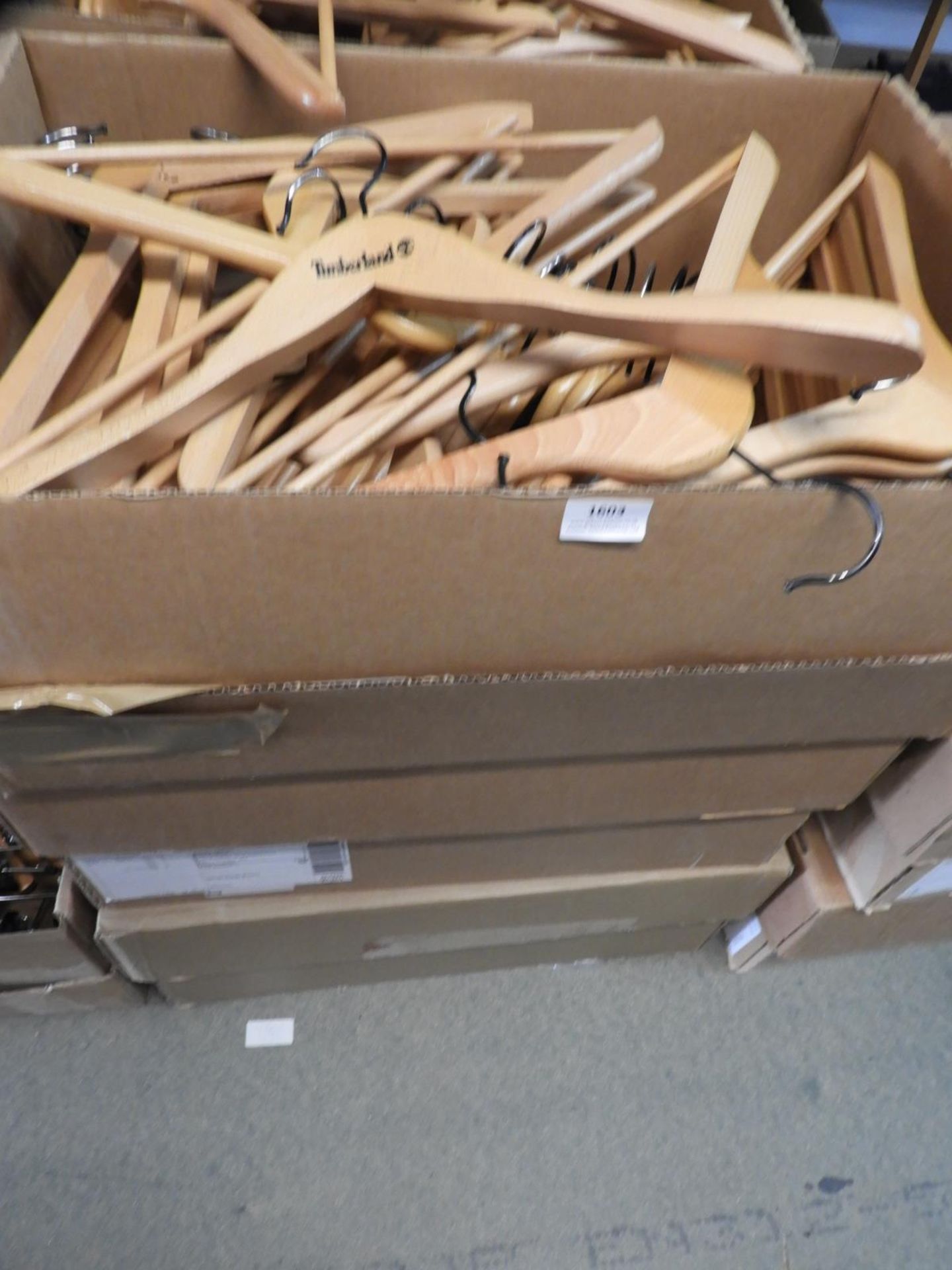 *Three Boxes of Wooden Coat Hangers Including Timb