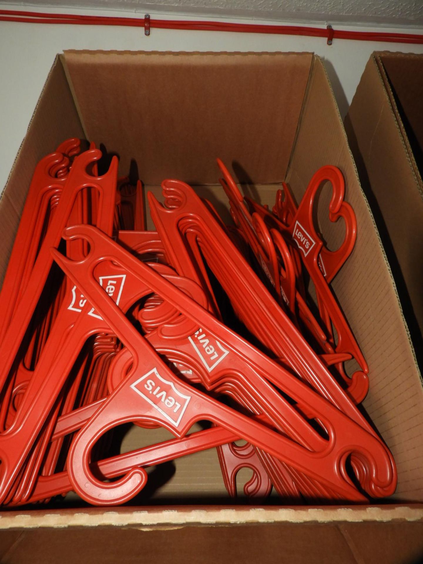 *Box Containing Vintage Levi Plastic Coat Hangers