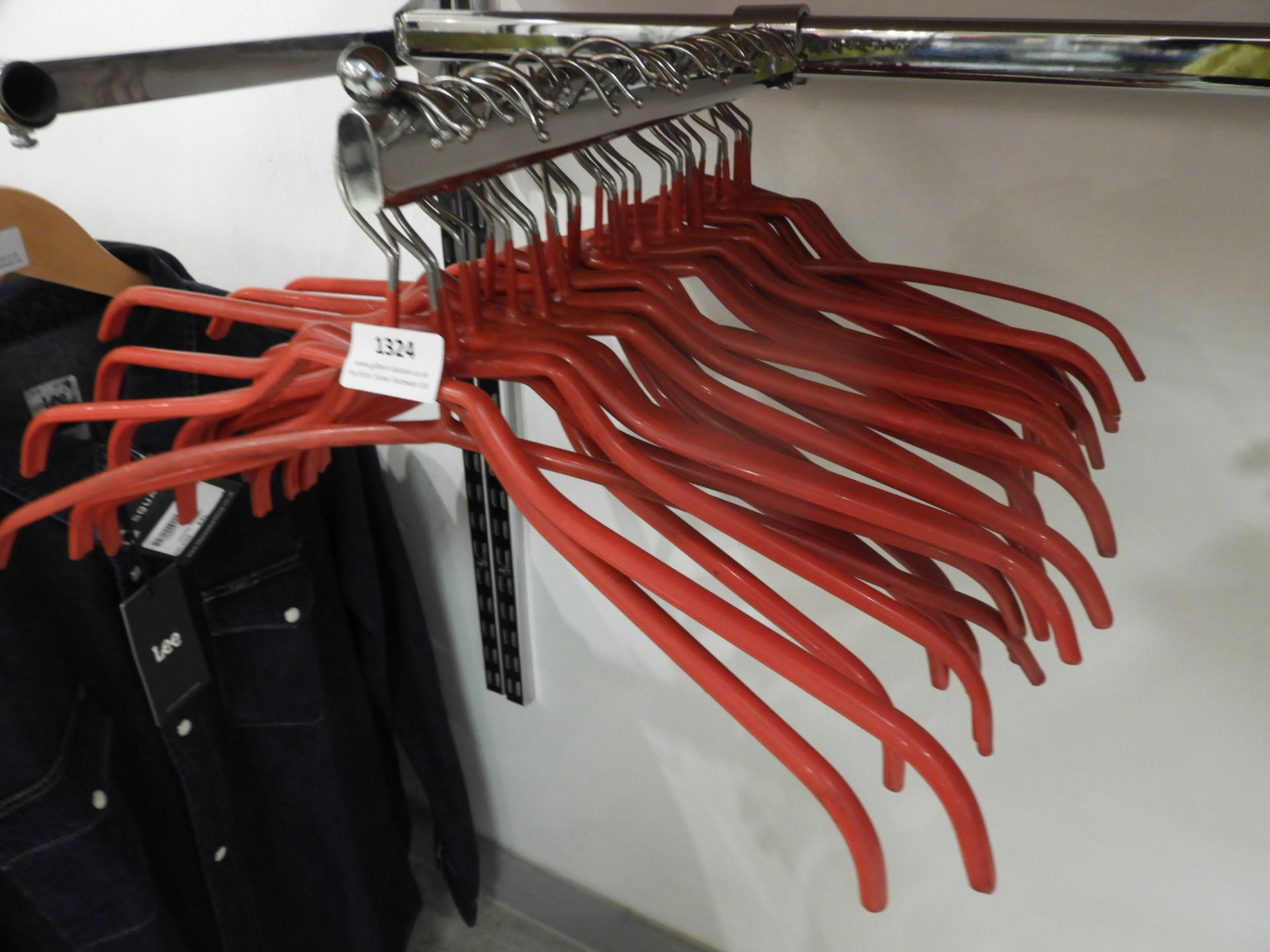*Thirty Four Chrome & Red Plastic Coated Coat Hang