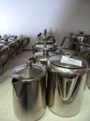 Seven Stainless Steel Water Jugs