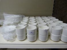 Sixty White Stacking Tea Cups with Saucers