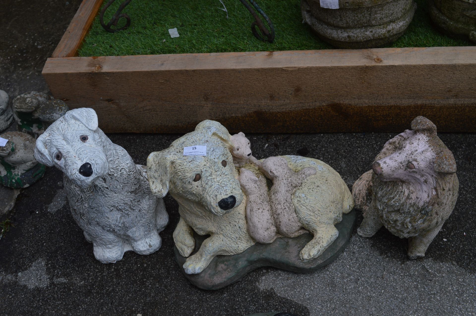 Three Garden Dog Ornaments