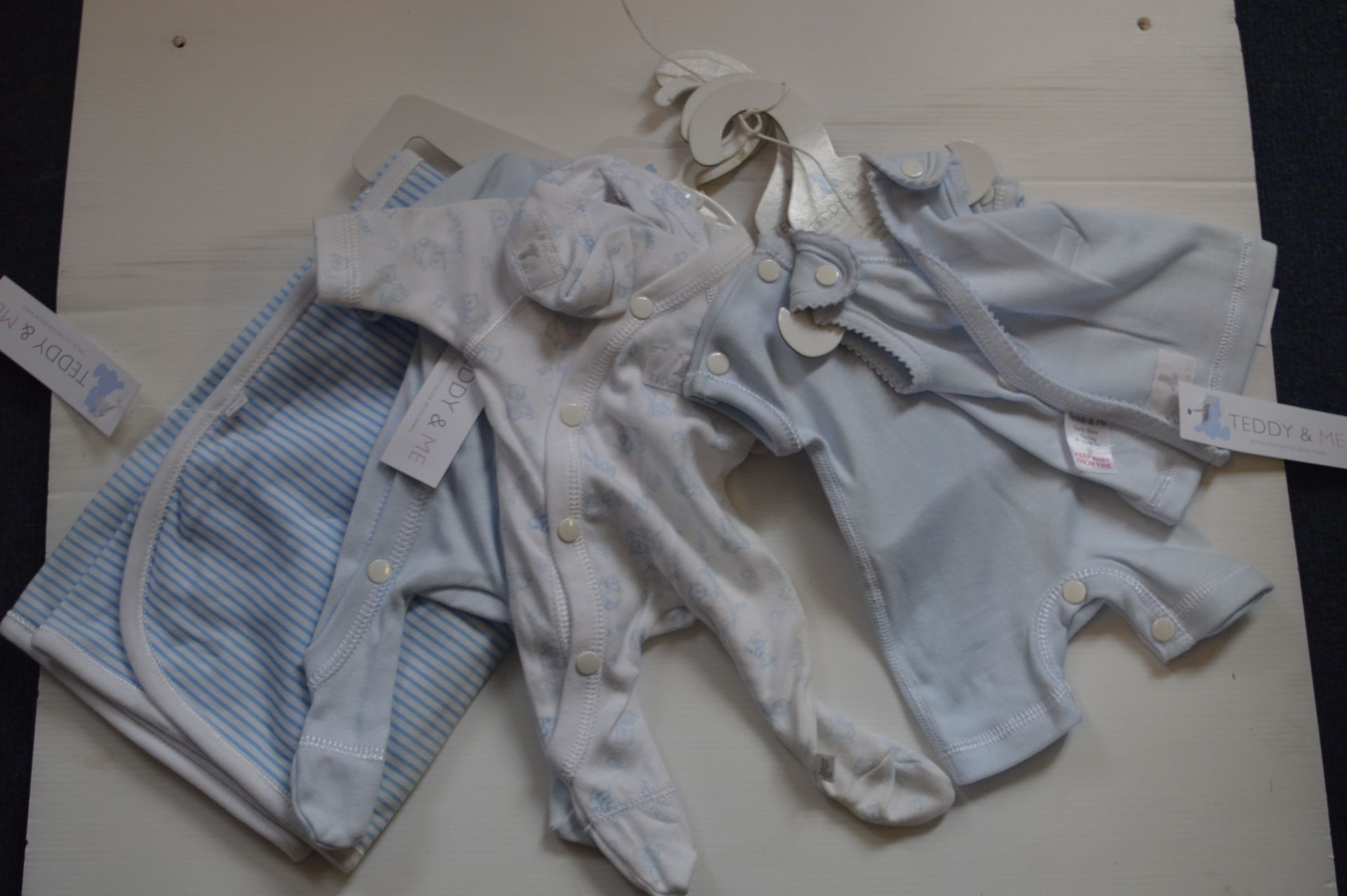 *Five Early Baby Clothes