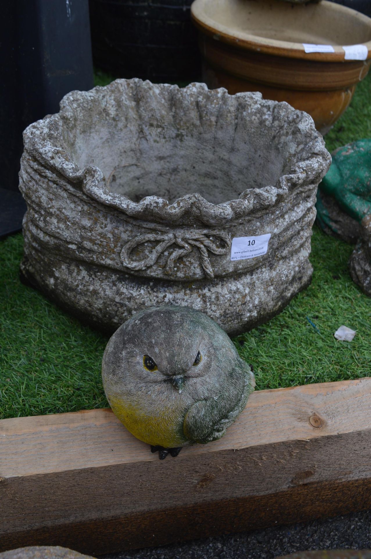 Sack Shaped Planter and a Bird