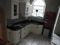 *L-Shaped Cream Corner Kitchen with Solid Wood Handles and Black Granite Work Surface