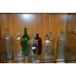 Nine Victorian Glass Bottles for Poison, etc.