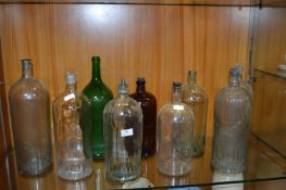 Nine Victorian Glass Bottles for Poison, etc.