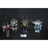 Four Diecast Transformers