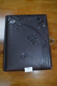 Victorian Postcard Album with Tooled Leather Cover and Illustrated Interior