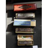 Three Harmonicas in Original Boxes