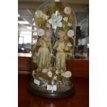 Victorian Glass Dome Containing Figurines of Children in a Floral Display