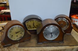 Four Mantel Clocks