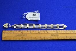 Hallmarked Silver Bracelet with Heart Shaped Locket - London 1978, approx 10g